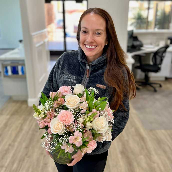 Dr. Velez with flowers